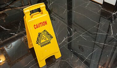 signage prevents slip and fall lawsuits filed by an accident attorney