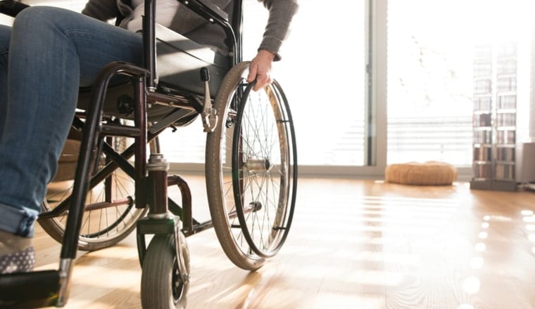 wheelchair-bound victim of spinal cord injury