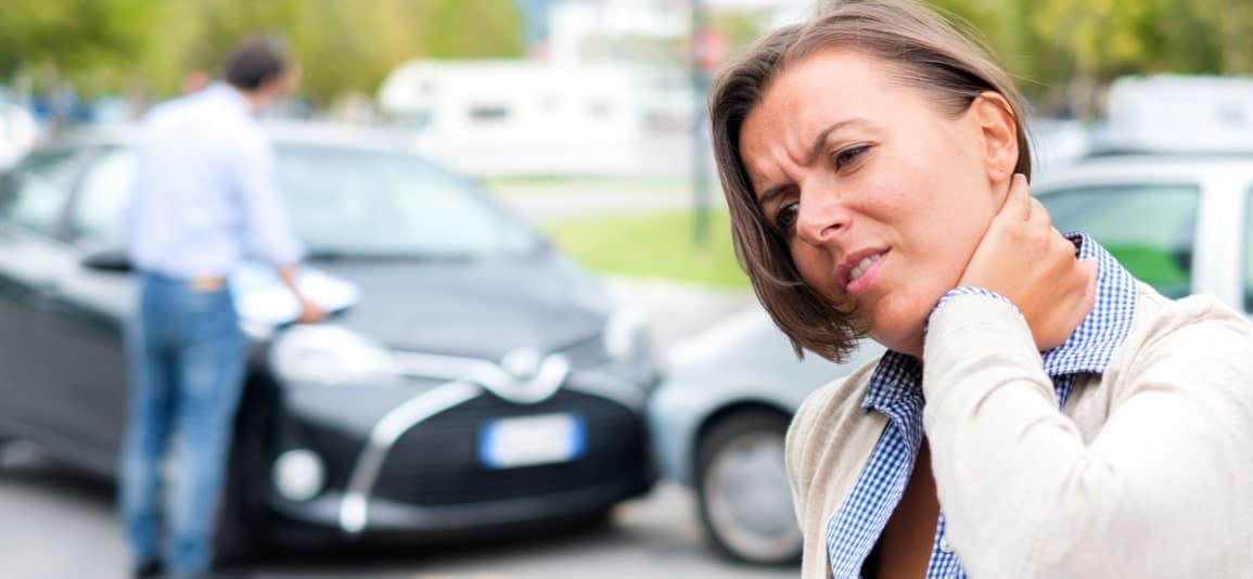 Woman with neck pain after a car accident in West Palm Beach FL