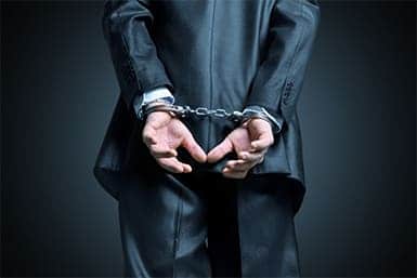 Man in business suit arrested for white collar crime in South Florida